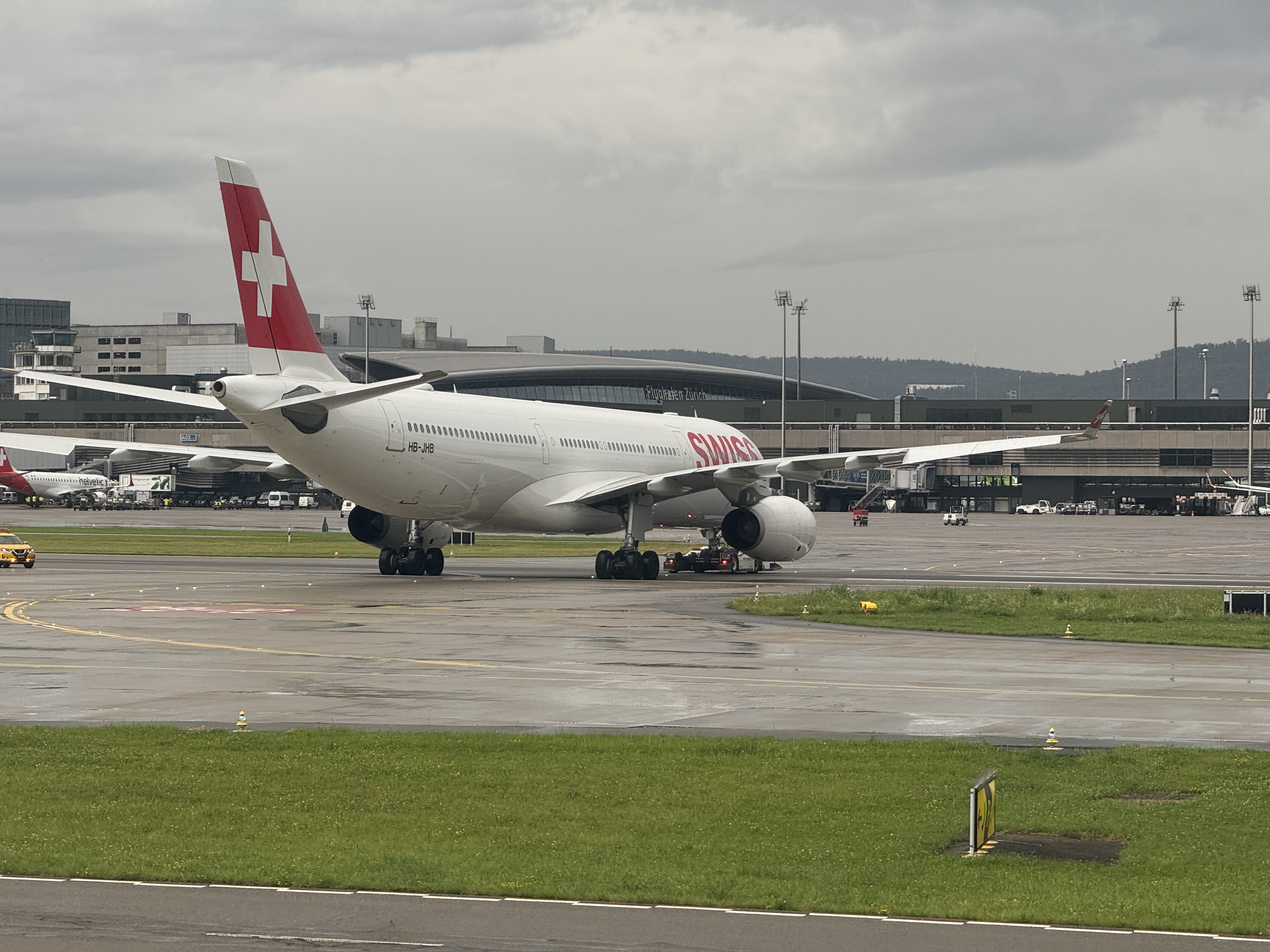 ̩SIN-BKK-ZRH77W