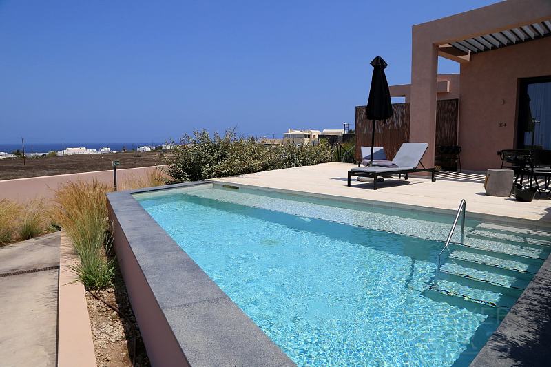 Santorini--Domes Novos Santorini Autograph Collection Outdoor Pool and Garden (5).JPG